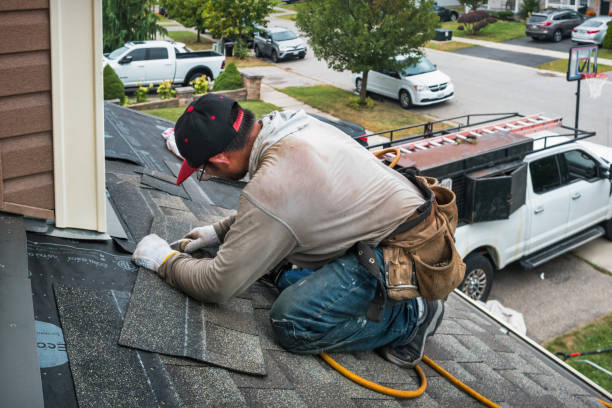 Professional Roof Repair technician working in Leslie, MI